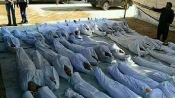 This image purportedly shows the bodies of Afghans killed in a Taliban raid on the Shia village of Mirza Olang, in the northern Sar-e Pol Province of Afghanistan, overnight on Sunday.